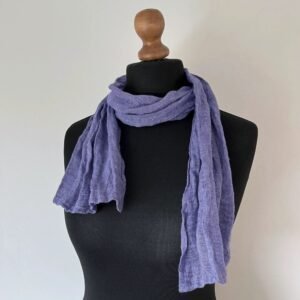 Small lavender purple scarf made of lightweight gauze linen fabric on a black mannequin.