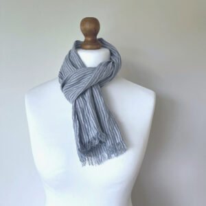 blue and grey striped small linen scarf styled on a white mannequin